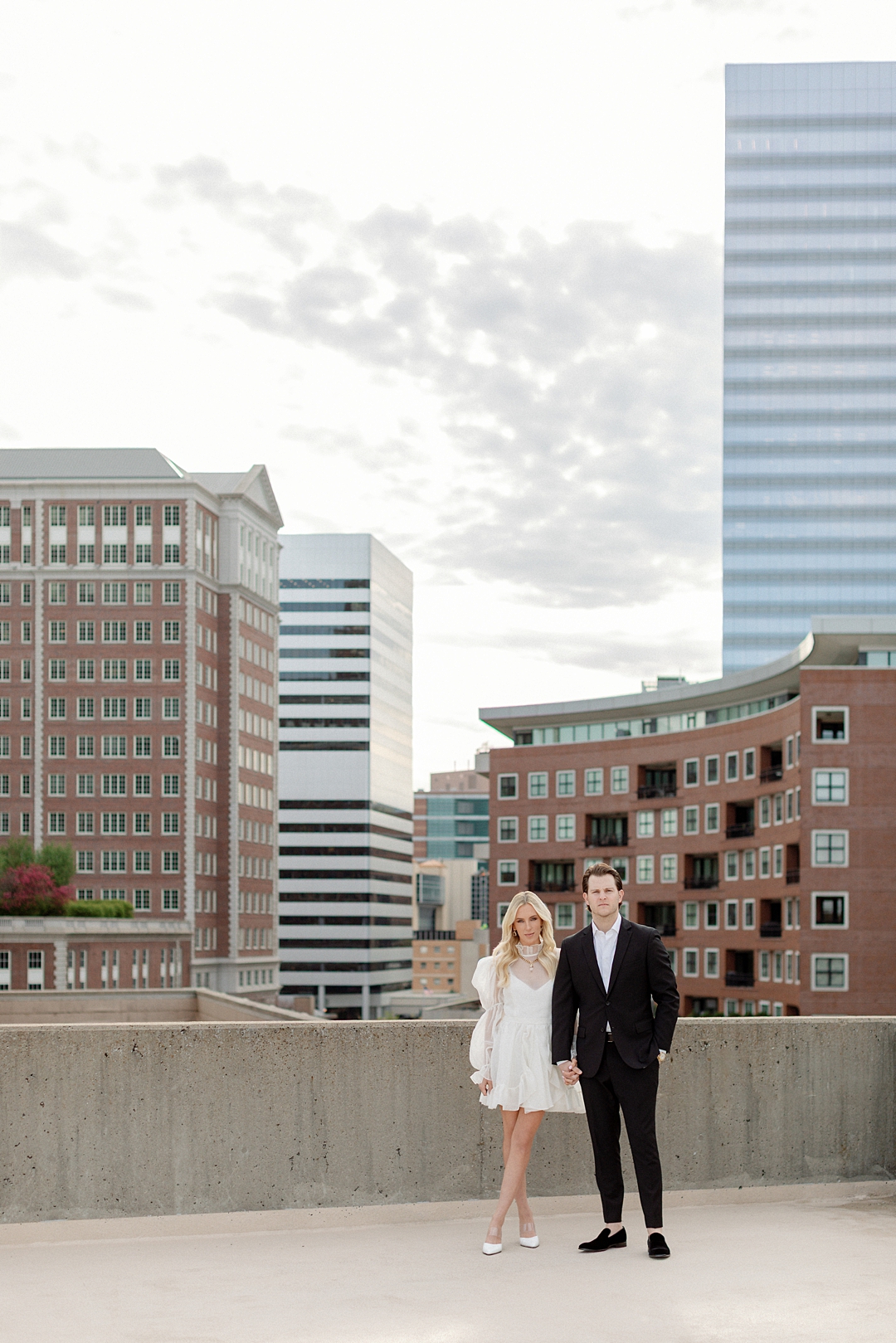 Downtown Clayton engagement photos of couple embracing in St. Louis