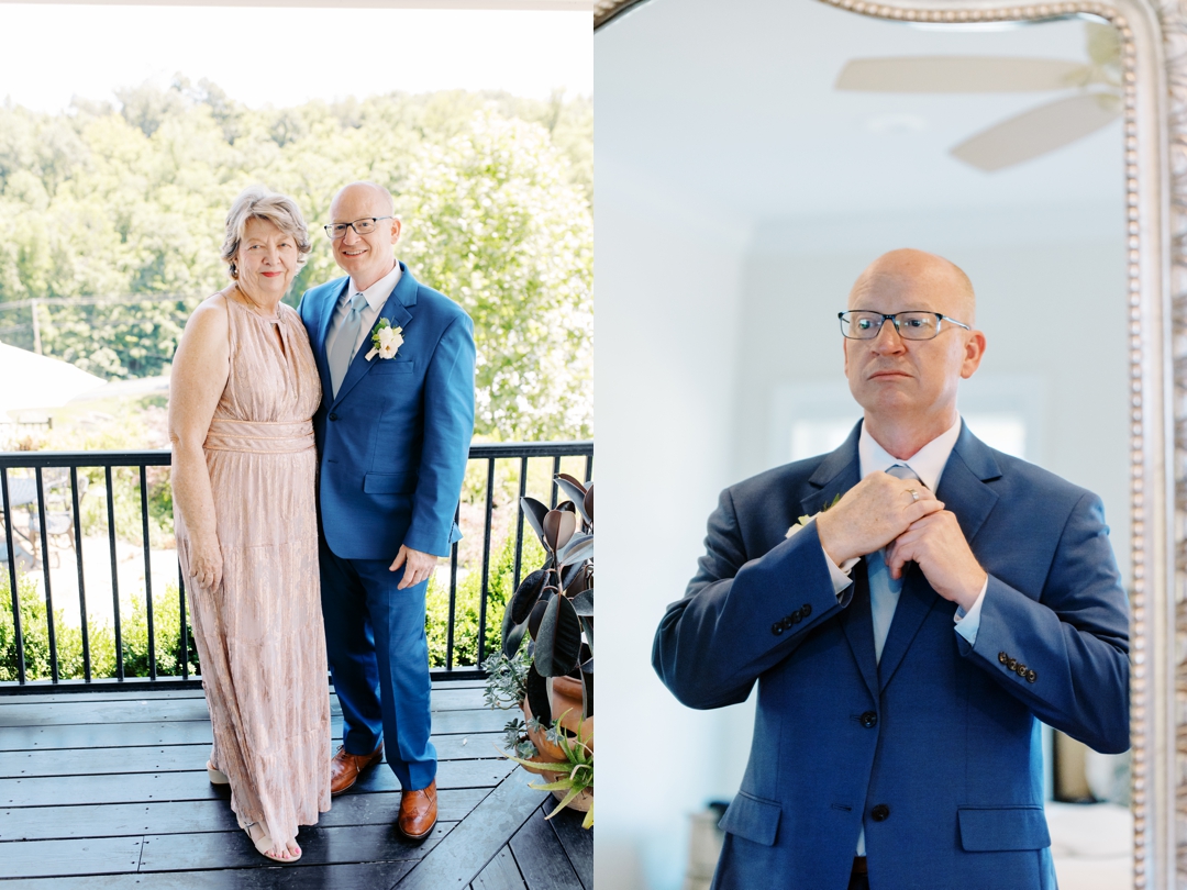 Russell adjusting his tie in the groom’s suite at Sunflower Hill Farm, with his wedding day attire neatly arranged.