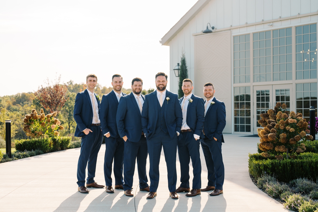 Wedding party portraits in front of Westwind Hills’ scenic outdoor landscape.