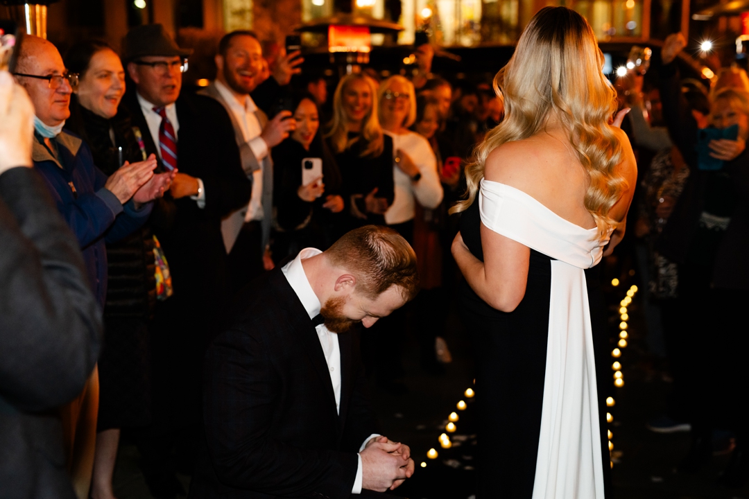 Eric, getting down on one knee to ask Gracie to be his wife.
