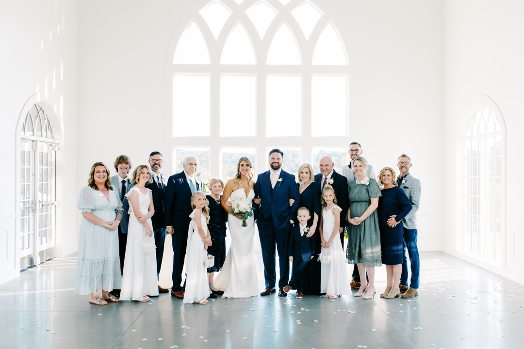 Formal family portrait with Alyssa, Matthew, and their loved ones during their Westwind Hills wedding.