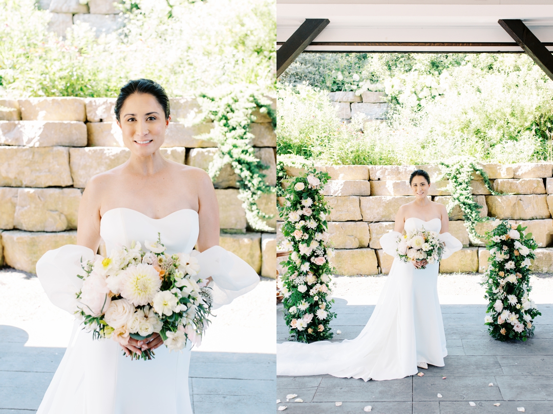 Suzie in her elegant Jenny Yoo gown, standing near the large windows of the bridal suite at Sunflower Hill Farm.