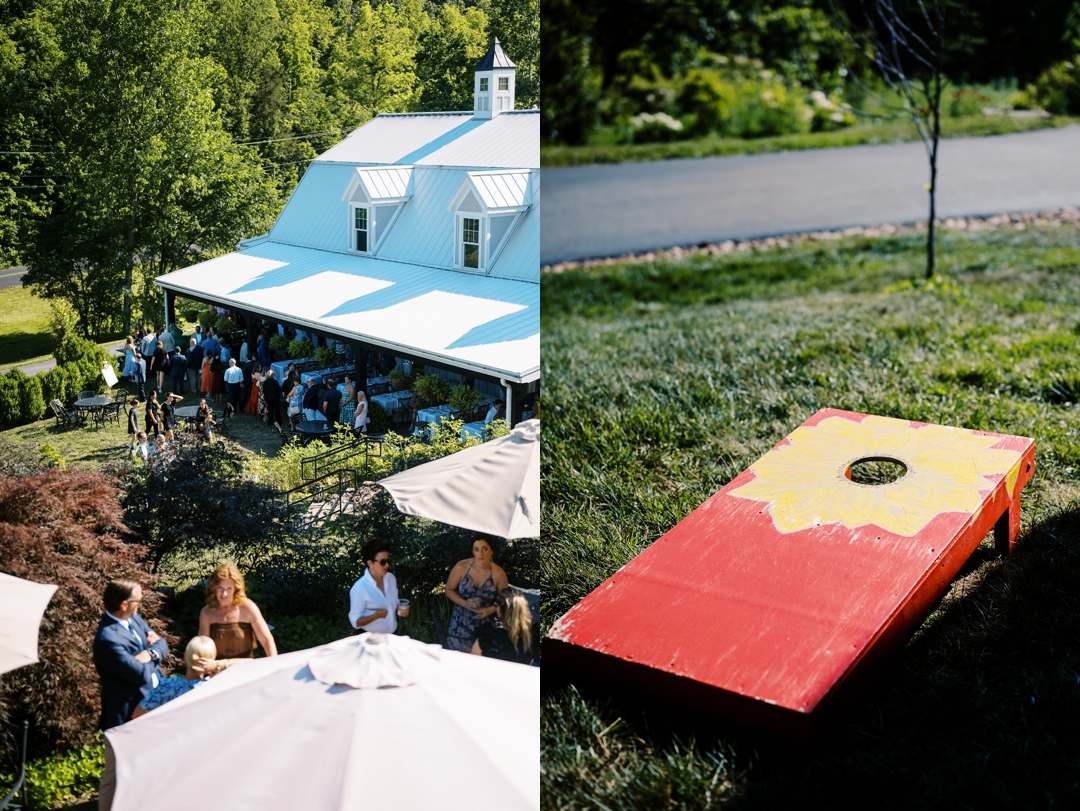 Guests enjoying cocktail hour at Sunflower Hill Farm, mingling under the covered patio with scenic views in the background.