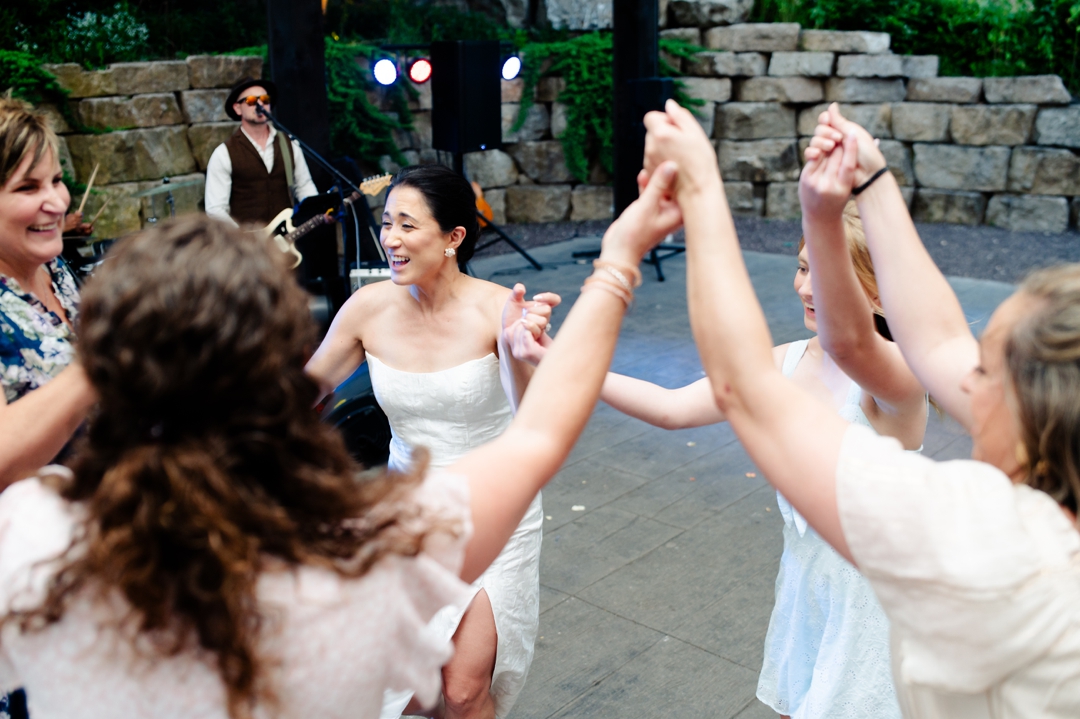 Guests dancing to music by Diamond Empire during Suzie and Russell’s wedding reception at Sunflower Hill Farm