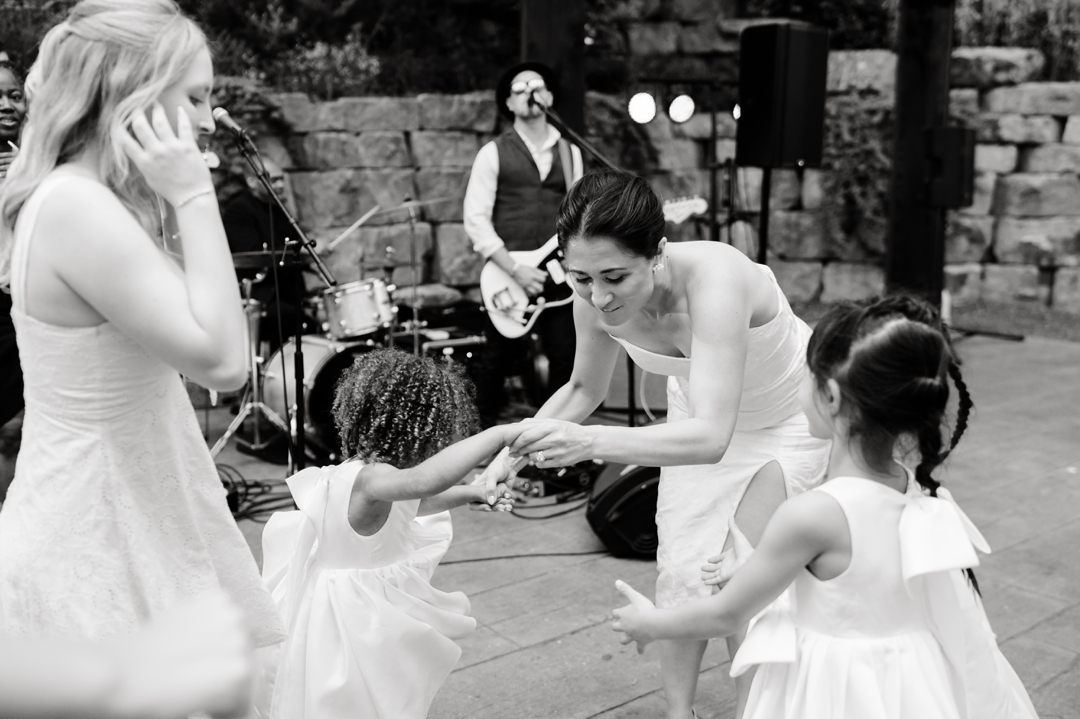 Guests dancing to music by Diamond Empire during Suzie and Russell’s wedding reception at Sunflower Hill Farm
