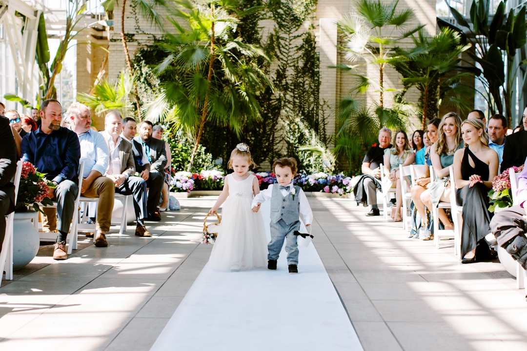 Wedding inside The Jewel Box under its stunning glass structure.