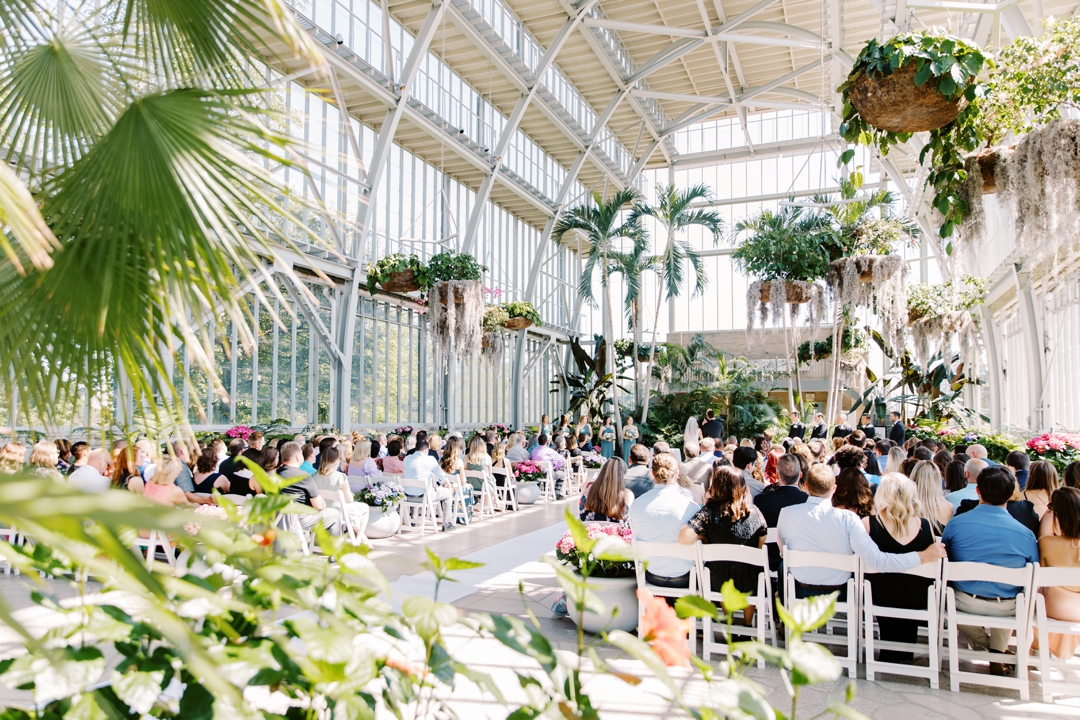 Wedding inside The Jewel Box under its stunning glass structure.