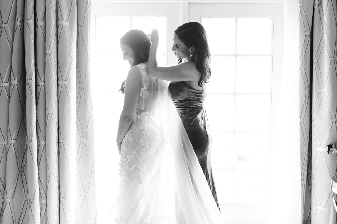 Bride getting ready in a luxurious suite at The Ritz-Carlton St. Louis.