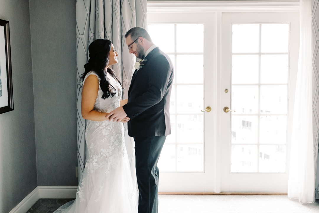 First look between bride and groom in a luxurious setting at The Ritz-Carlton St. Louis.