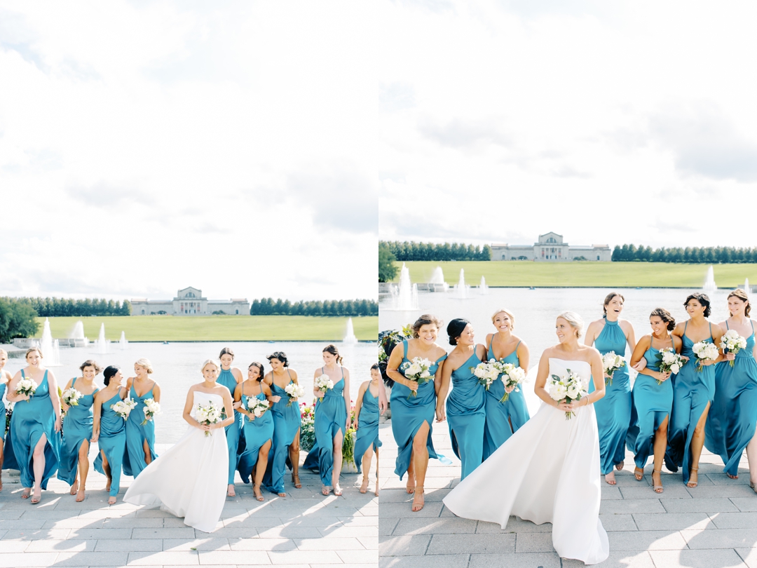 Candid shot of the wedding party laughing together in Forest Park.