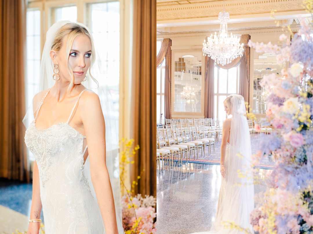 Bride Deane posing elegantly in front of vibrant spring florals at the Missouri Athletic Club.