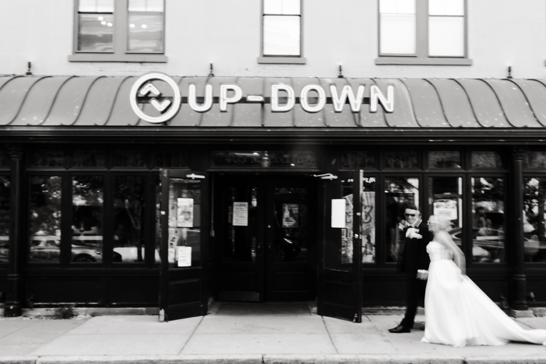 Playful wedding photos outside Up-Down STL in downtown St. Louis.