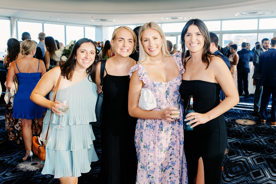 Guests mingling during cocktail hour at The Chase Park Plaza with elegant decor and warm lighting.