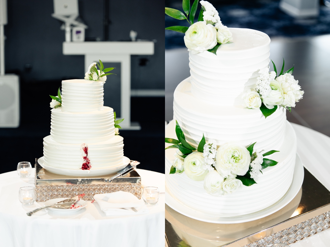 Wedding cake display at The Chase Park Plaza with elegant floral decorations.