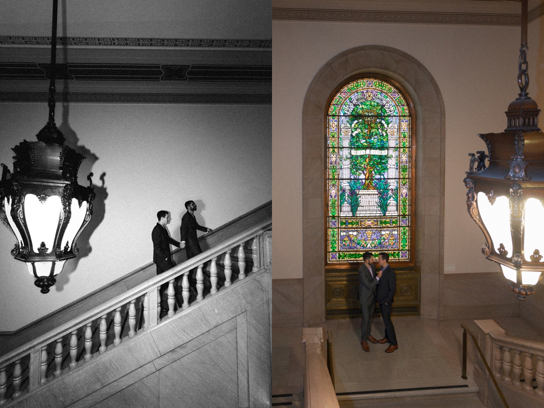 LGBTQ+ couple walking through St. Louis Central Library archway in a loose editorial style.