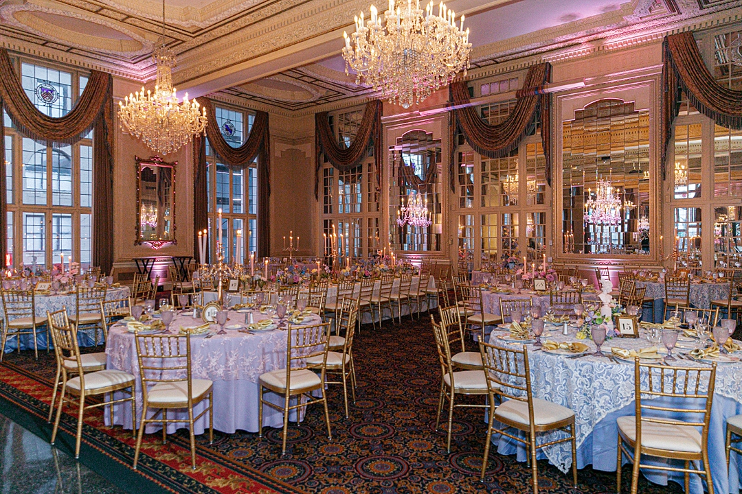 Colorful candlelit wedding reception inside the Missouri Athletic Club