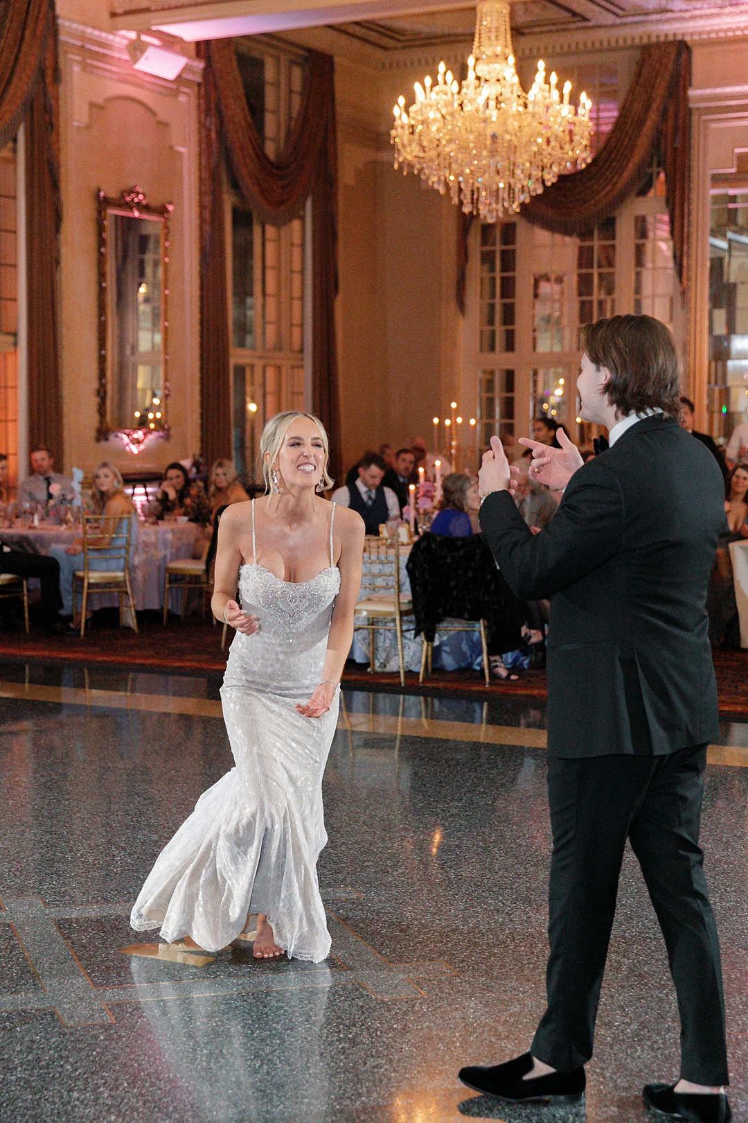 Deane and Jeff sharing their first dance inside the ballroom