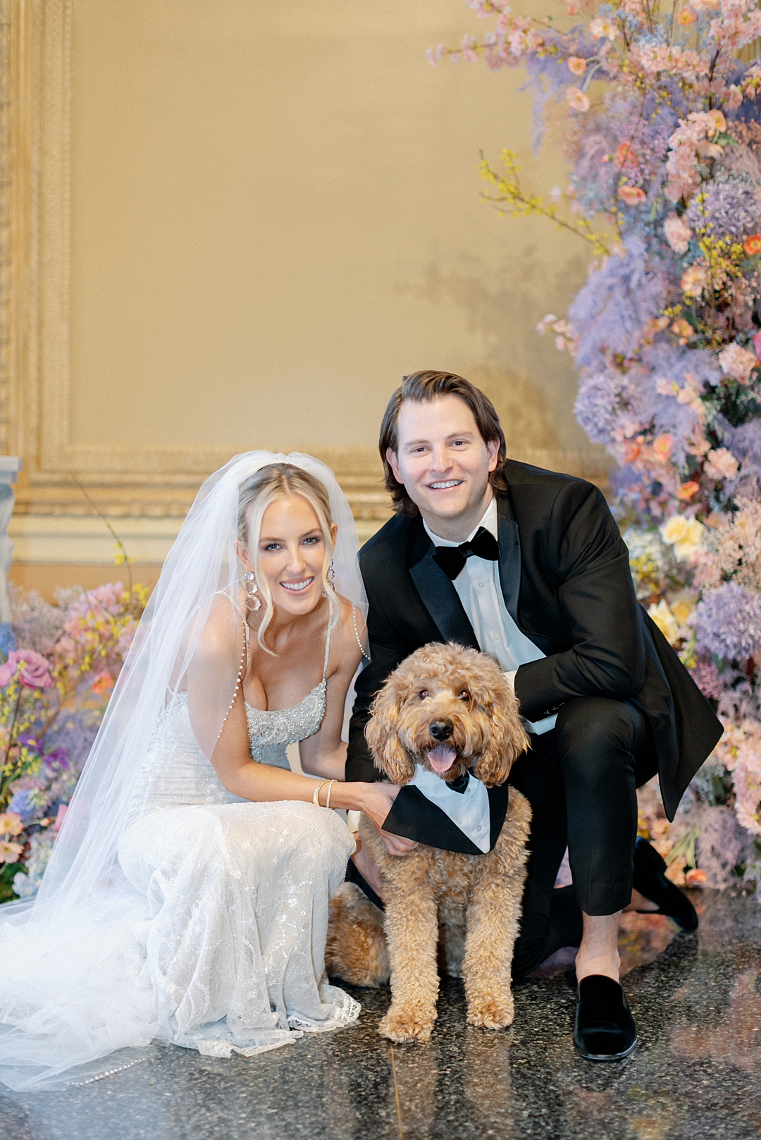 Deane and Jeff with their golden doodle at the Missouri Athletic Club