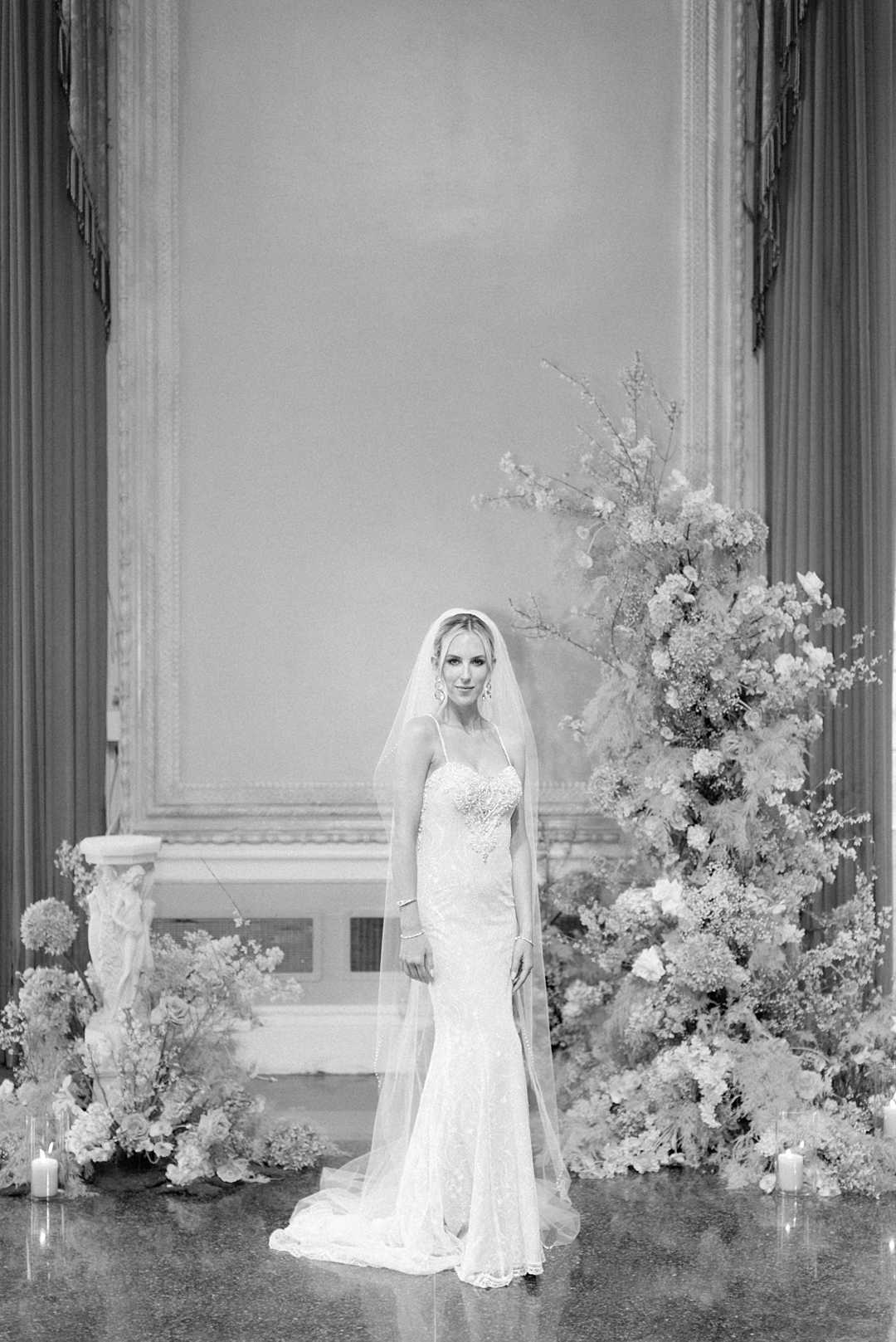 Fanara Photography- Deane & Jeff Wedding-75 loose editorial of bride in front of florals at the st. louis mac in black and white