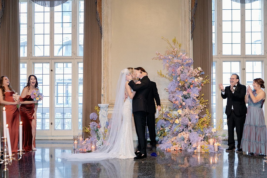Deane and Jeff sharing their first kiss during the ceremony