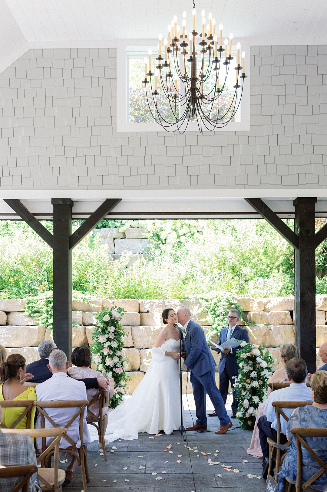 Covered patio ceremony at Sunflower Hill Farm wedding