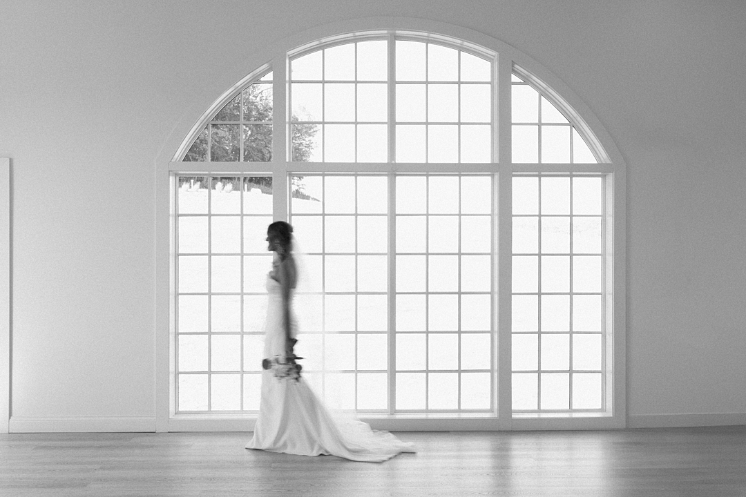 Blurry photo of bride walking at Westwind Hills