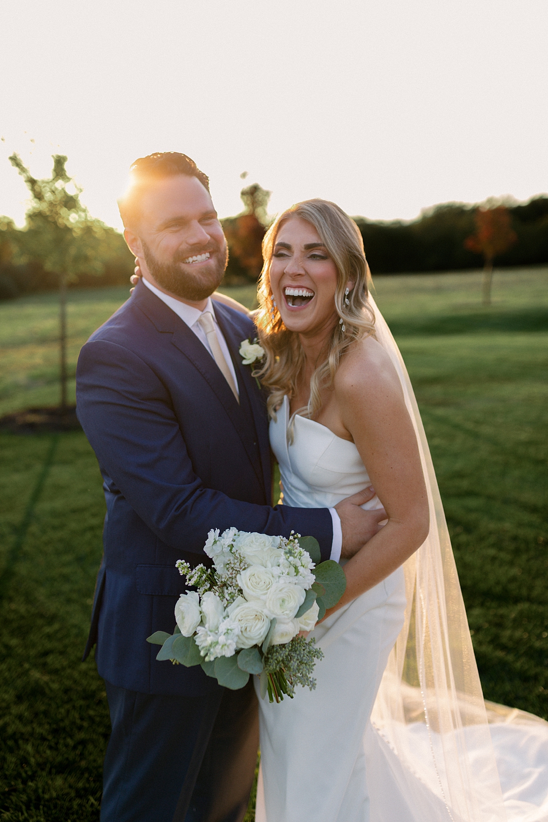 Bride and groom portrait at sunset outside Westwind Hills wedding venue