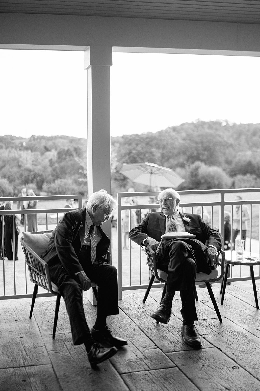 Emotional candid moment between wedding guests