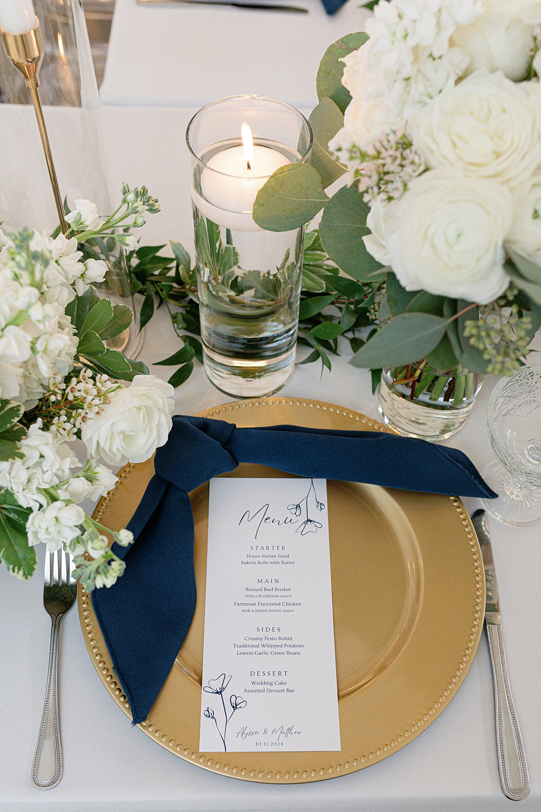 Reception table setting with floral details at Westwind Hills wedding