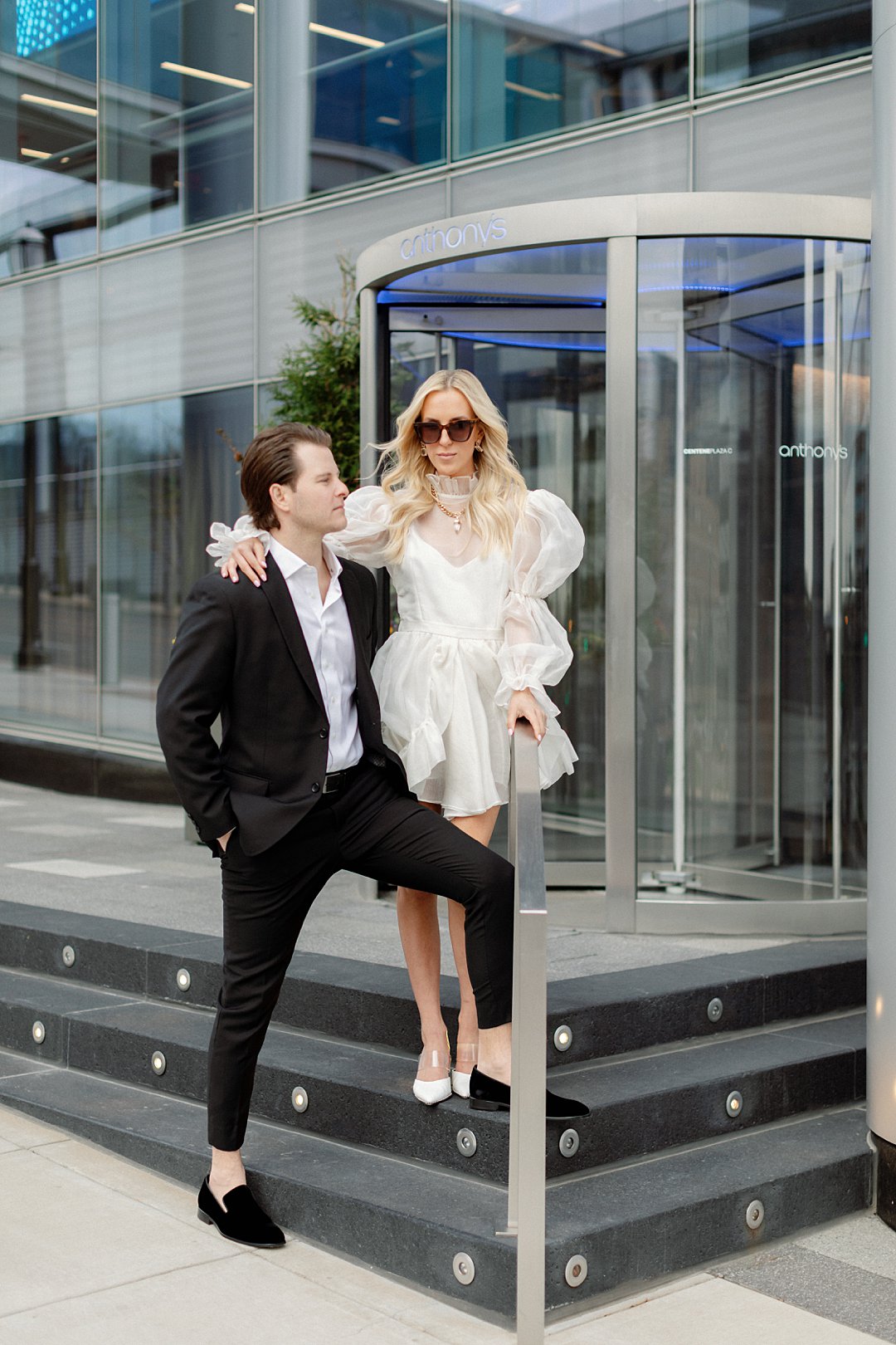 Editorial engagement portrait in downtown Clayton with city buildings
