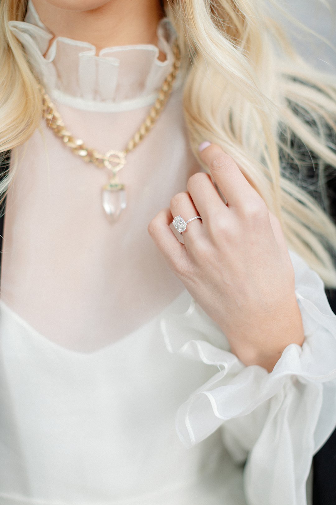 Necklace and dress detail from downtown Clayton engagement session
