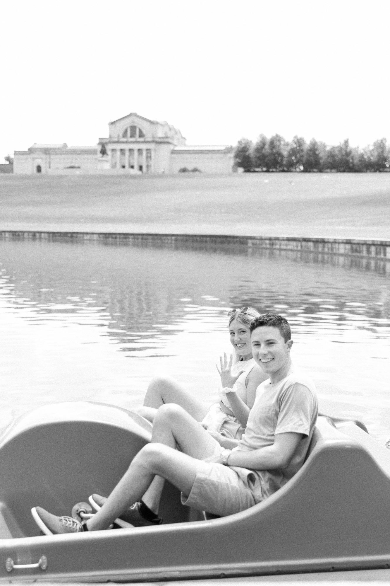 Black and white portrait on a paddle boat after a proposal in Forest Park St. Louis