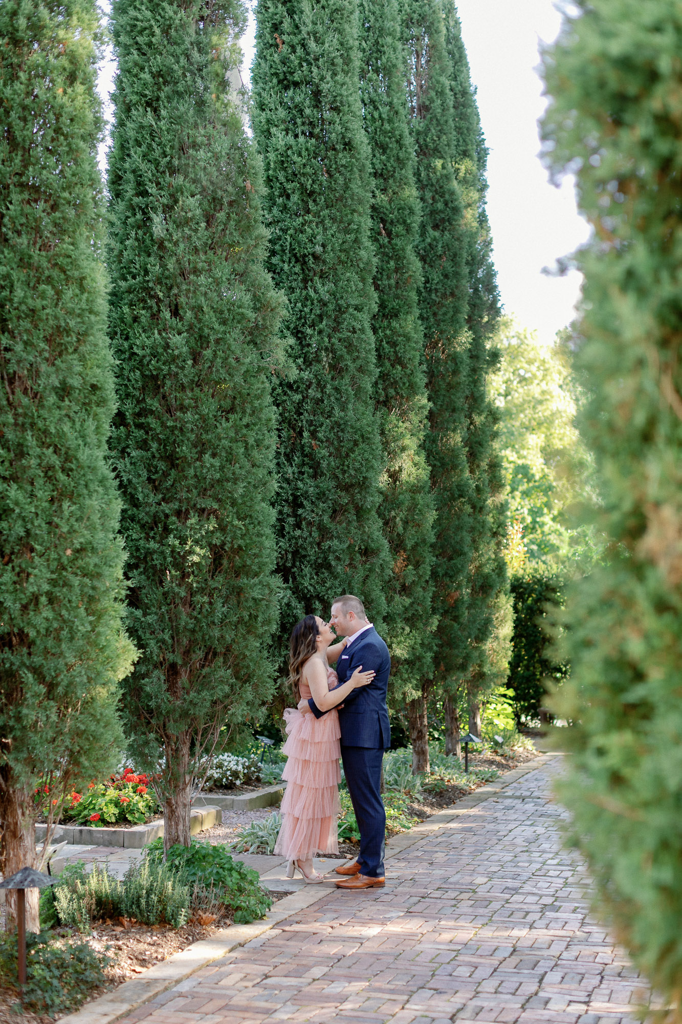 Engagement session at Missouri Botanical Garden in St. Louis with tall cypress trees