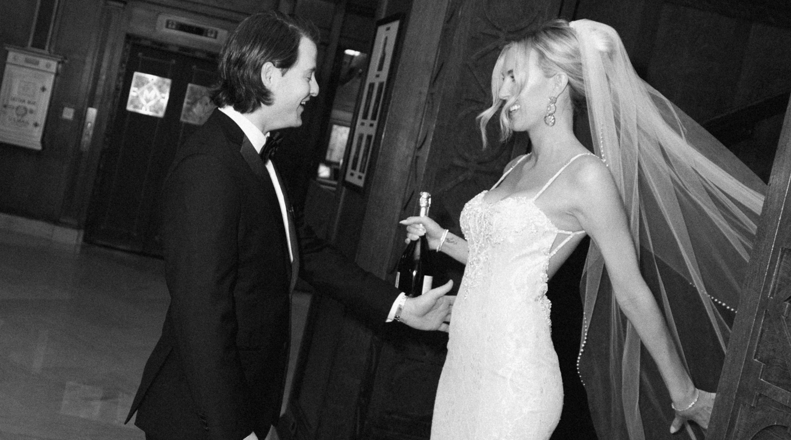Bride and groom together during first look photos at the Missouri Athletic Club