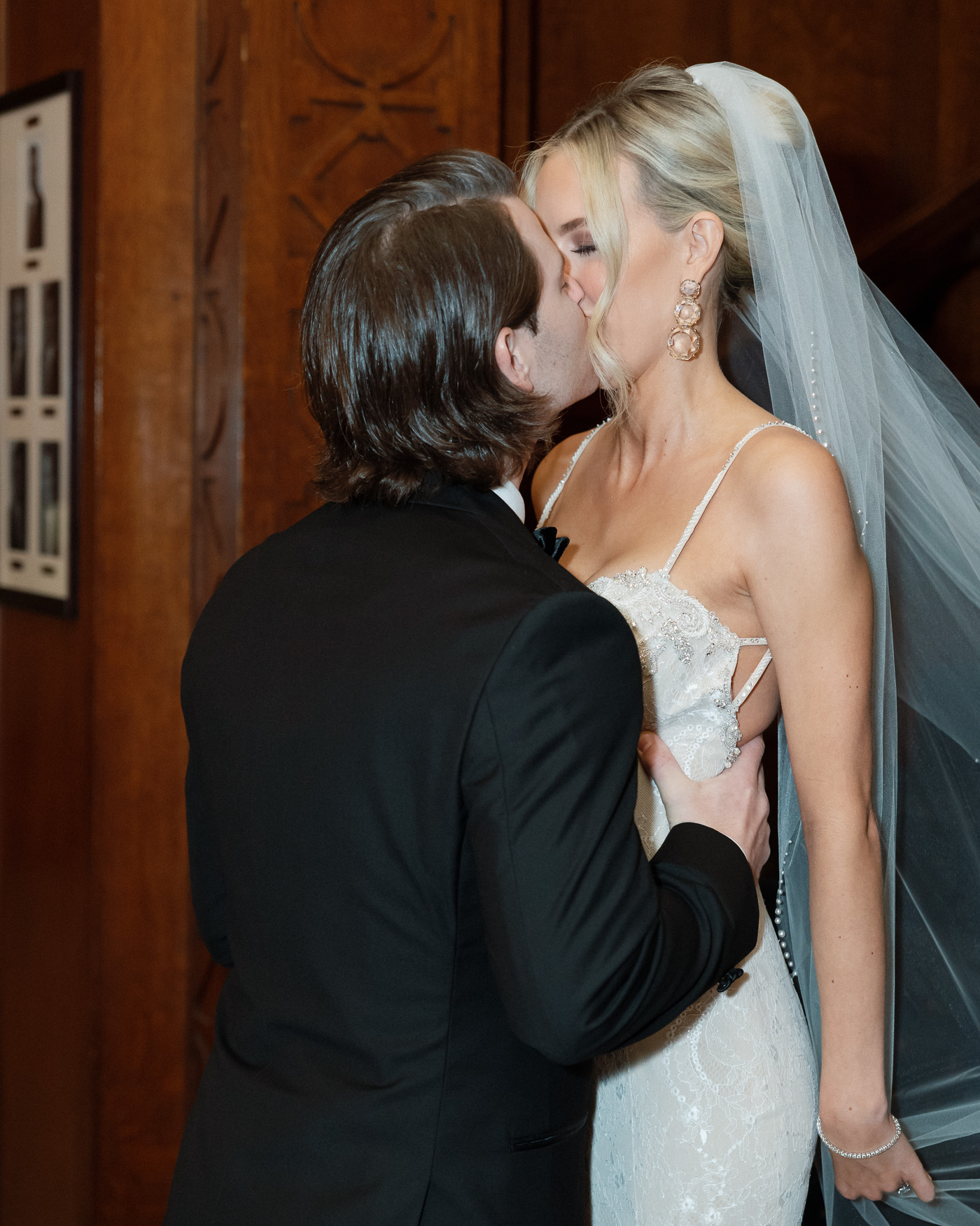 Bride and groom after their champagne first look at the Missouri Athletic Club