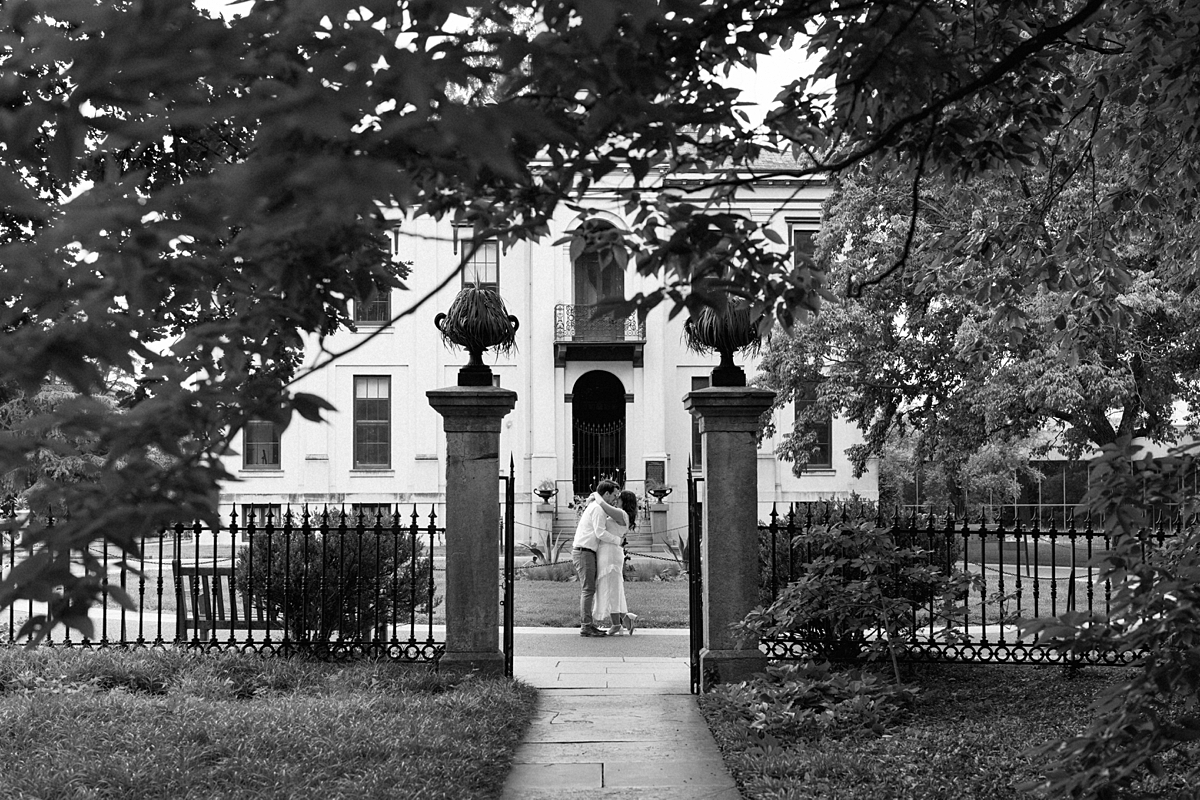Elise and Hayden framed by garden architecture at the Missouri Botanical Garden