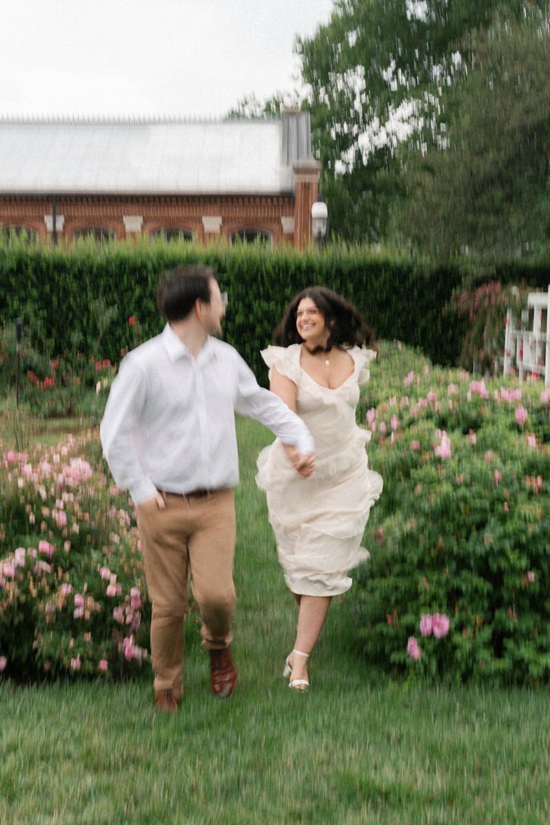 Elise and Hayden walking through flowers at the Missouri Botanical Garden
