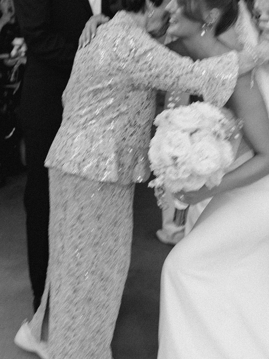 Katie greeting a guest during the wedding celebration