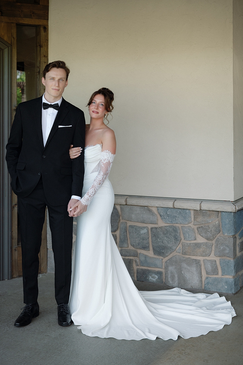 Full-length wedding portrait of Luke and Katie