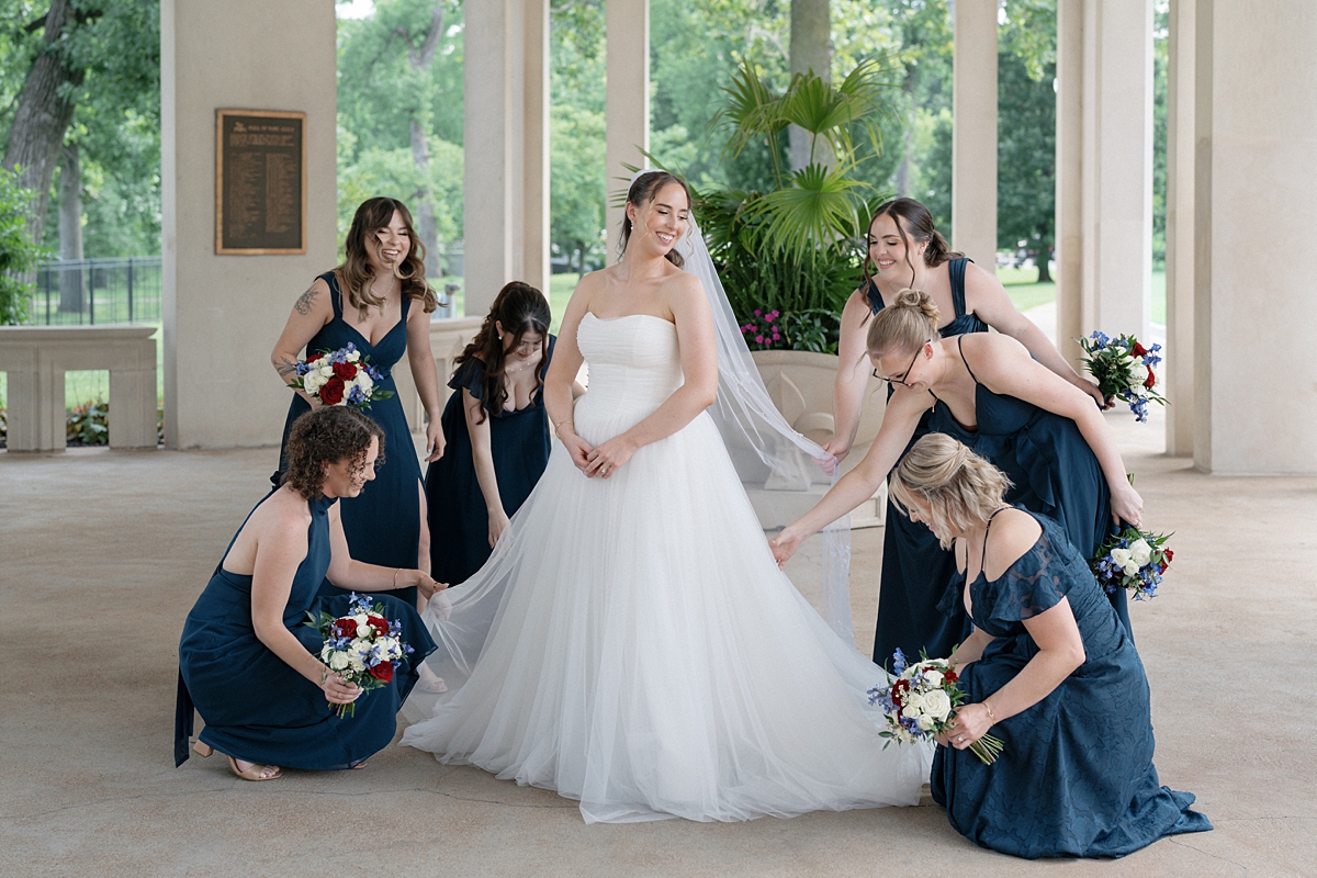 Jill with her bridesmaids during wedding party portraits in Forest Park
