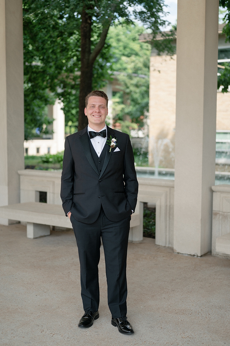 Editorial groom portrait of Dylan in Forest Park St. Louis