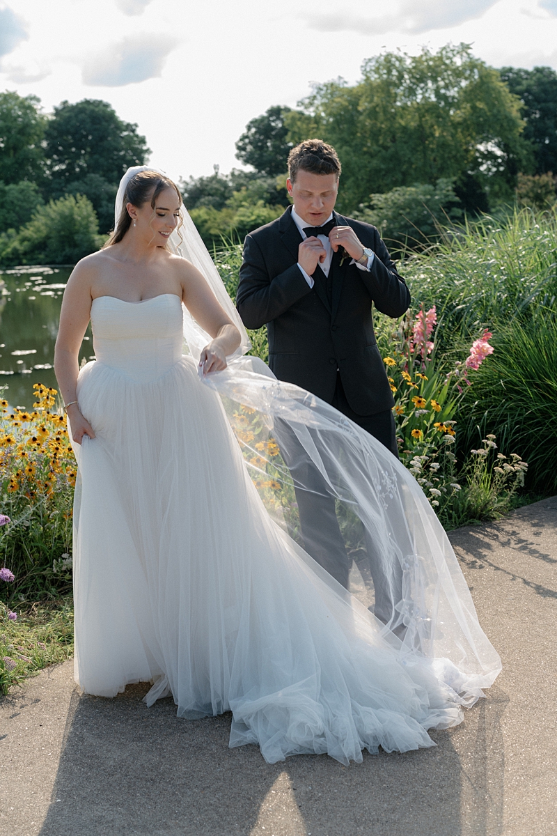 Jill's wedding dress moving during Forest Park portraits