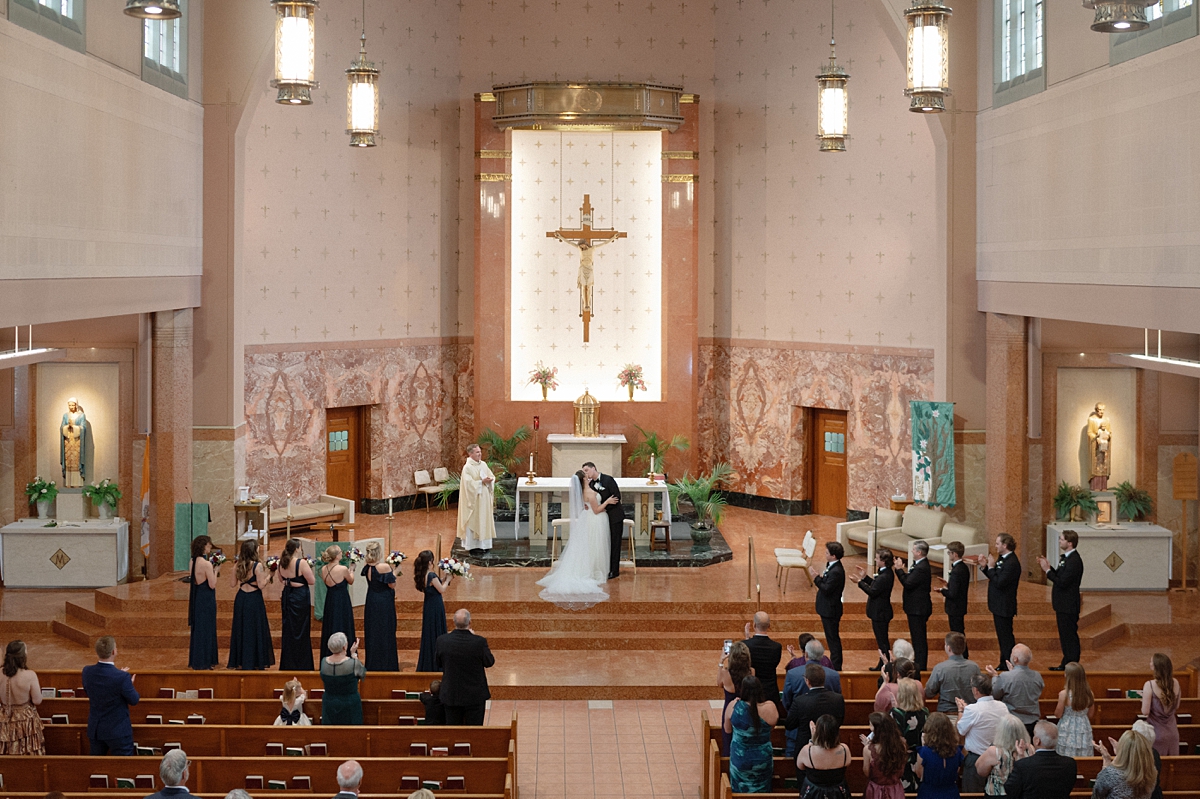 Jill and Dylan during their wedding ceremony at St. Gabriel Catholic Church in St. Louis