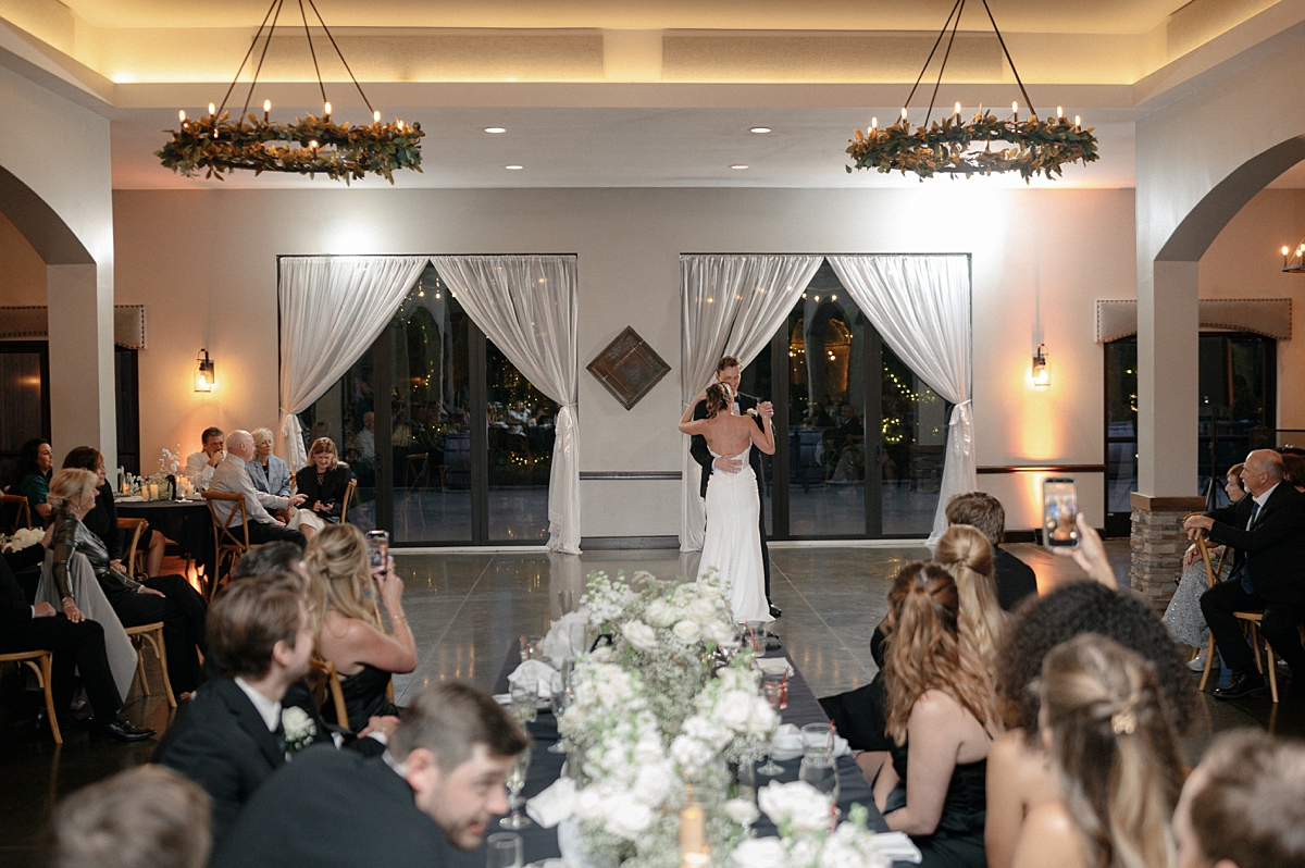 Wedding guest recording a celebration on a smartphone