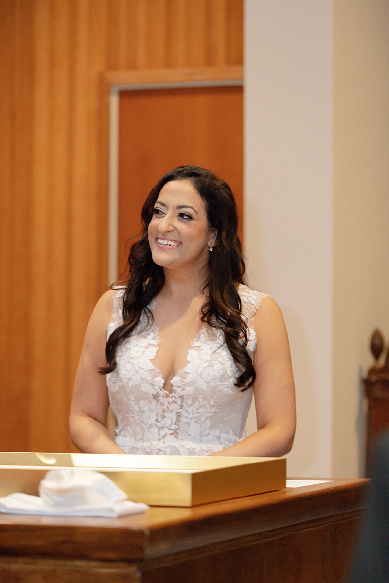 Allie smiling during the ketubah signing
