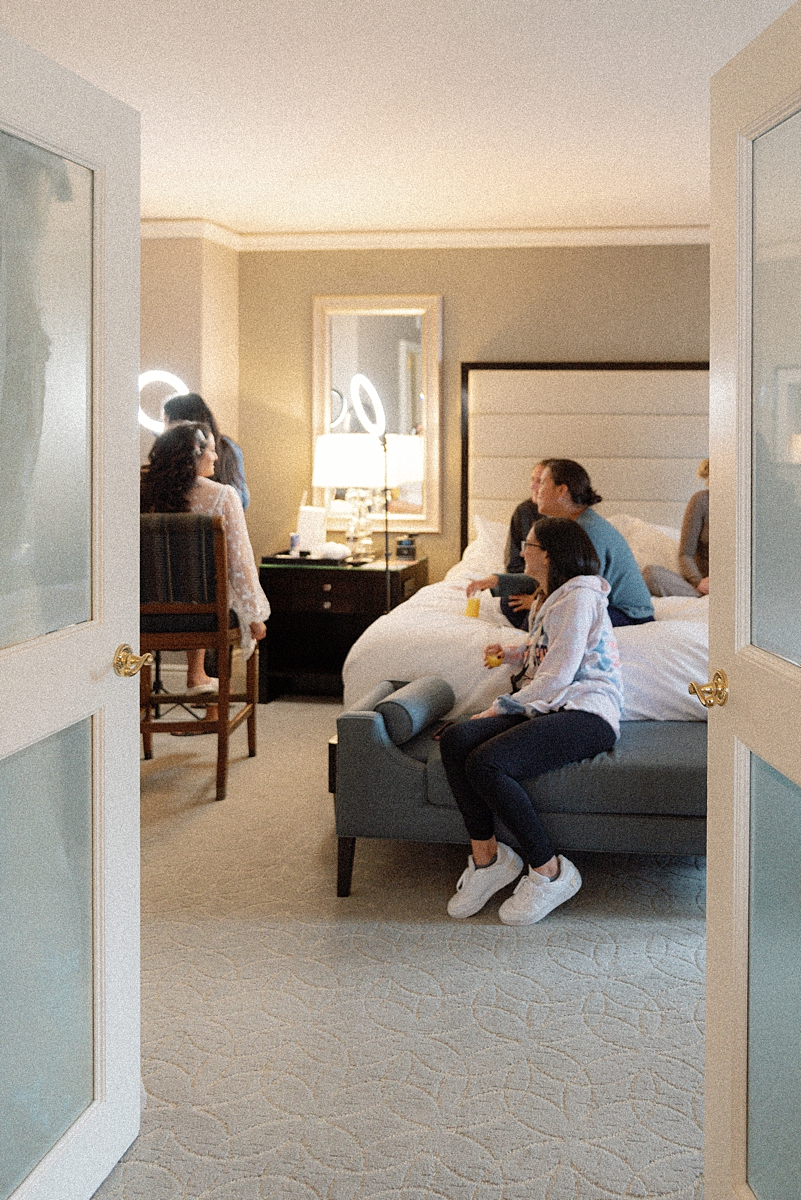 Allie having hair and makeup done in her Ritz-Carlton hotel room
