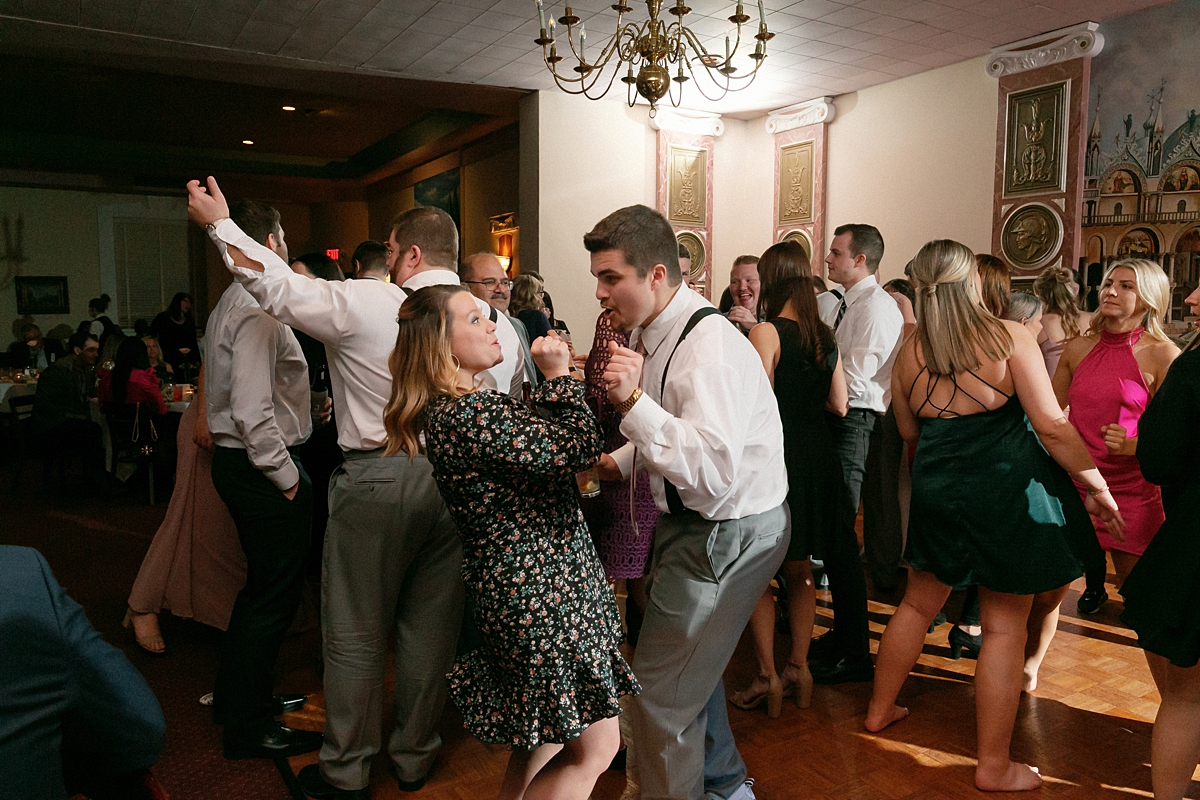 Crowded dance floor during Andrea and Jason's Rose of the Hill reception