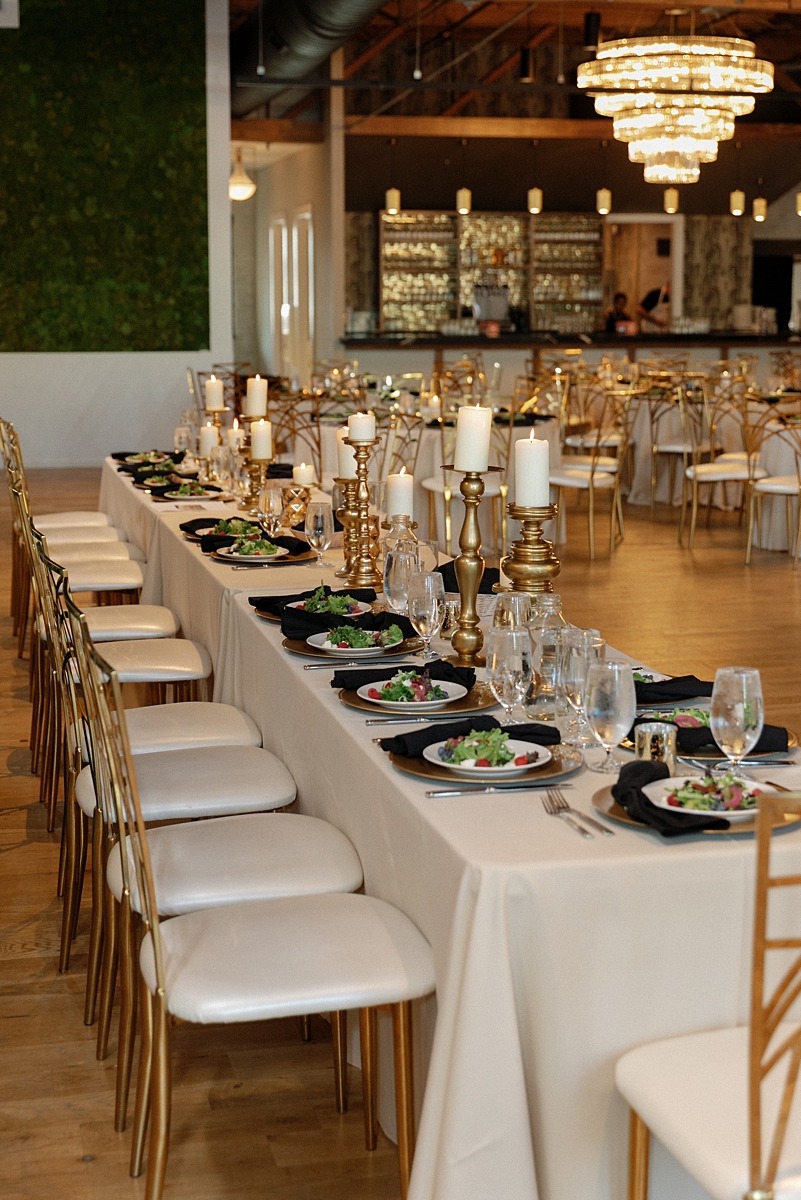 Wedding guests applauding during Lauren and Nick's ceremony at The Bardot Kansas City